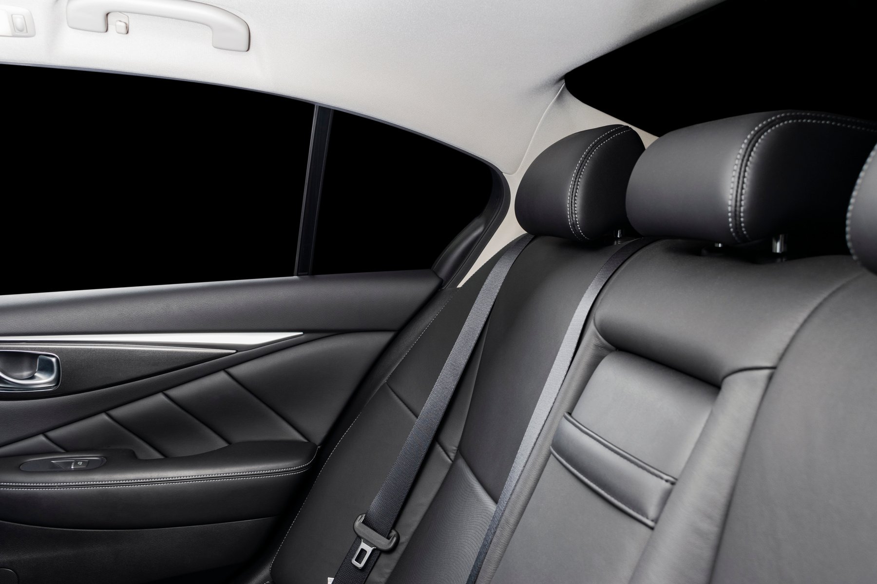 Car inside. Interior of a car. Comfortable leather seats. Perforated leather. Car interior details. Car detailing